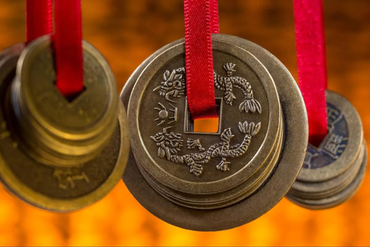 Feng Shui Singapore Wealth and Prosperity Symbols Traditional Chinese Feng Shui coins symbolising wealth and prosperity in feng shui Singapore consultations.